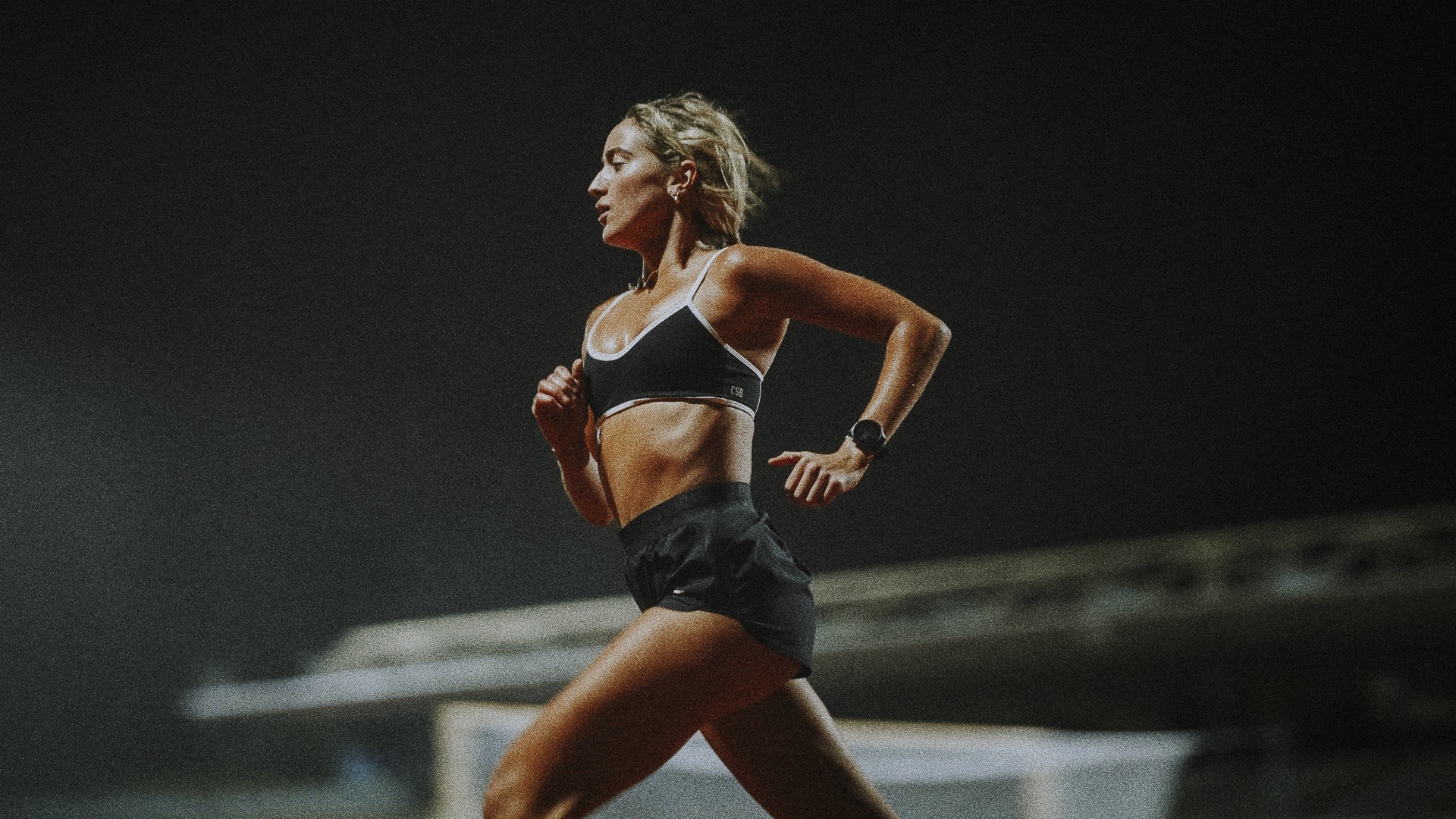 Hyro athlete sprinting on track