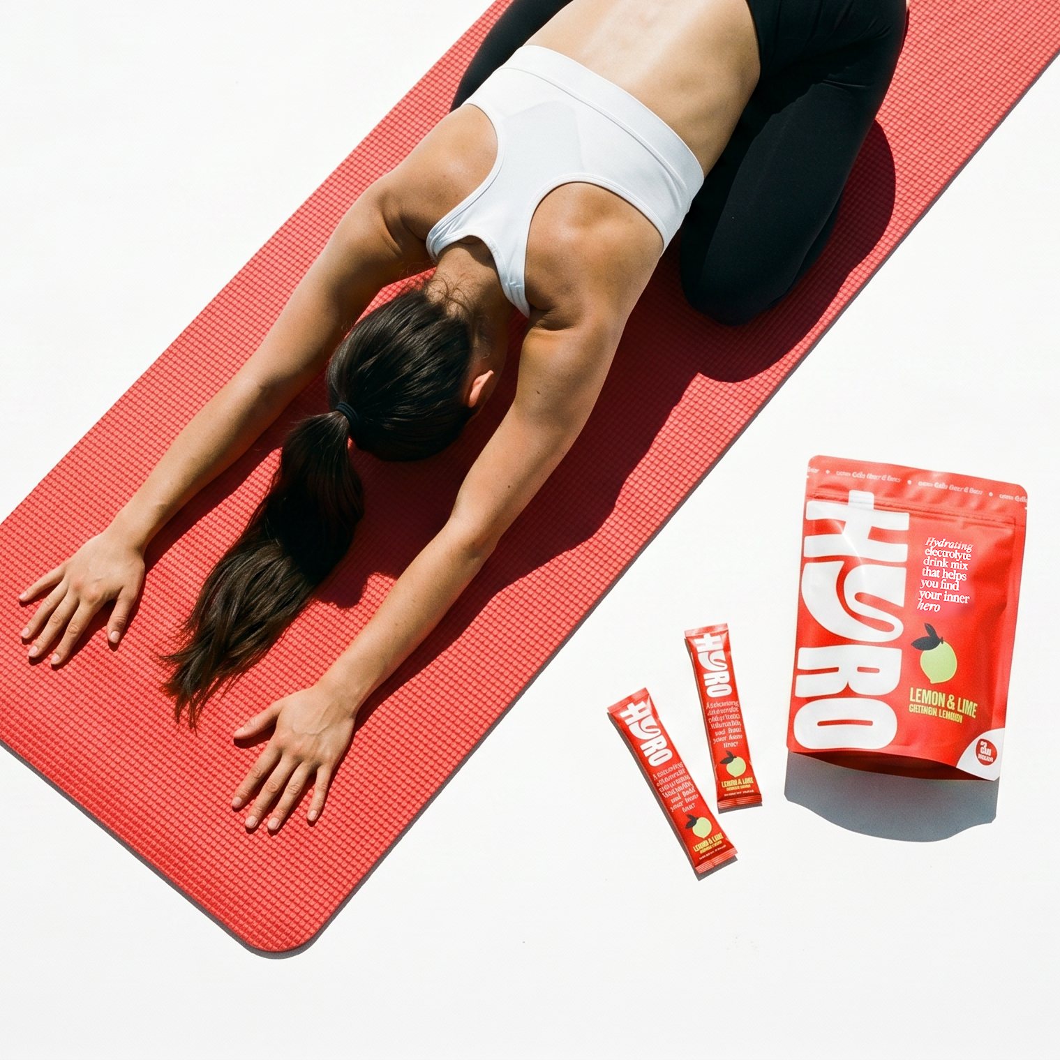 Woman on pilates mat with Hyro
